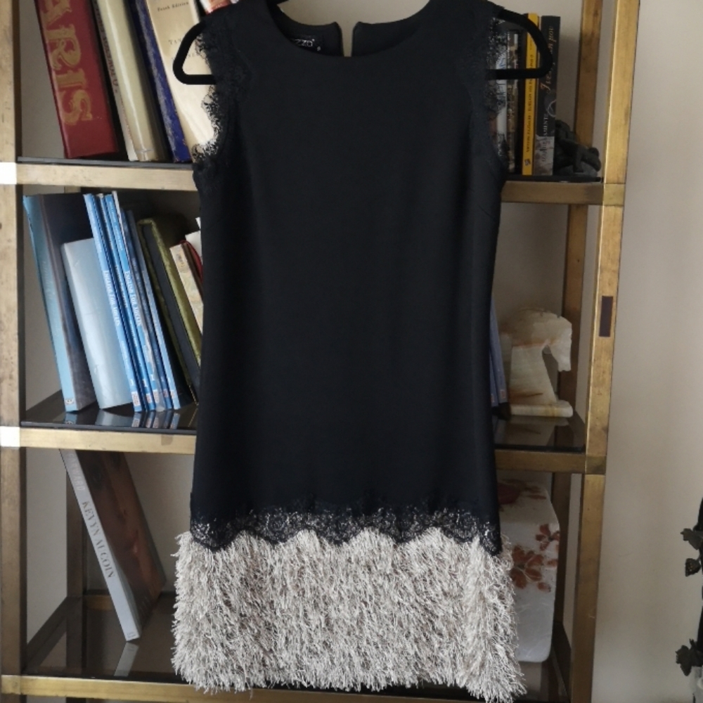 Black sleeveless sheath dress